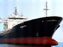 Schiff liegt im Hafen an, symbolisiert Schiffsagentur